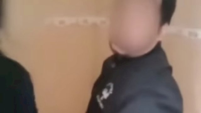 Tangkapan layar video seorang yang diduga guru mesum di toilet musala di Bogor. 