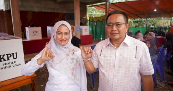 Indah dan Fauzi Nyoblos di TPS 06 Saptamarga, Ajak Masyarakat Kawal Demokrasi