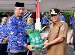 Hari Kesadaran Nasional, Pj Gubernur Sulsel Serahkan 4.100 Bibit Pohon dan 2.341 SK PPPK