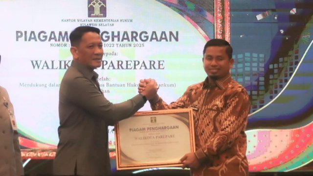 Wali Kota Tasming Hamid Raih Penghargaan Kemenkumham atas Dukungan Pembentukan Posbakum